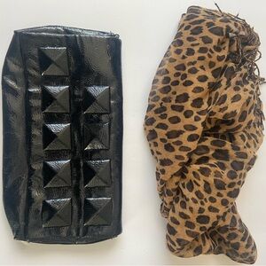 This black clutch purse is nice. It has a small strap.